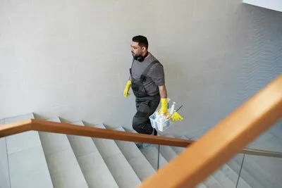 Full shot man walking on stairs