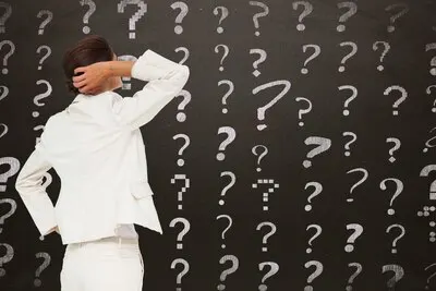 Businesswoman with questions