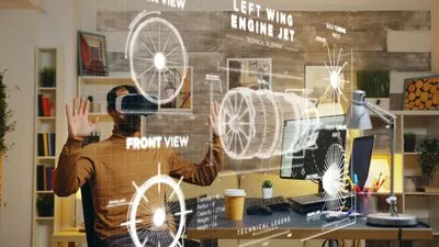 Freelancer at home wearing VR goggles using augmented reality to visualize final result after working on machinery construction using cad engineering software on computer, developing engine product