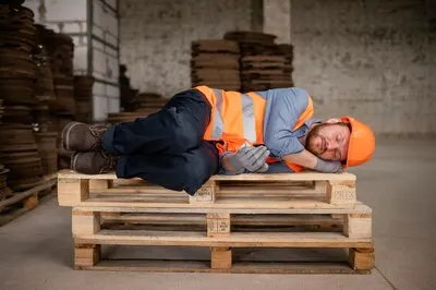 Man taking a break from work and sleeping