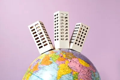 Paper style earth globe with buildings