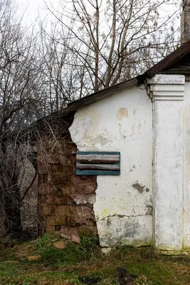 View of abandoned and decaying house in nature