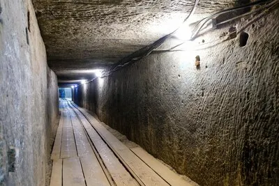 Dark extensive stone hall of an abandoned mine