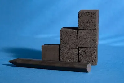 Display of dark charcoal in different forms and shapes