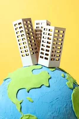 Paper style earth globe with buildings