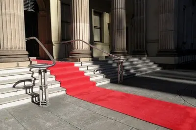 Red carpet in front of a luxury hotel