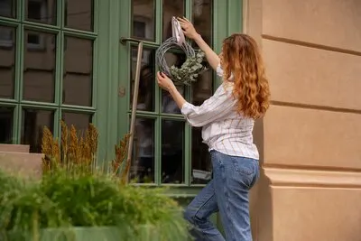 Lifestyle of person decorating their front door