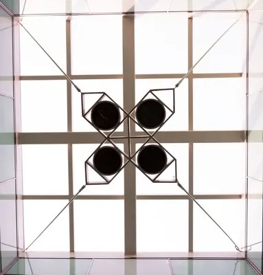 Bottom view of ceiling with geometric object
