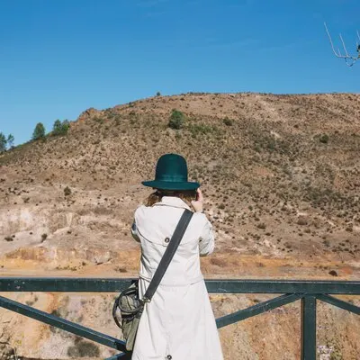 Woman taking shots of the hill