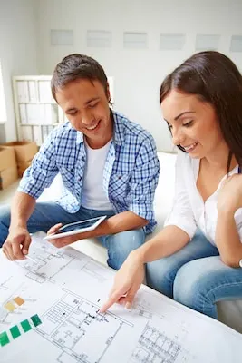 Couple looking at the floor plan