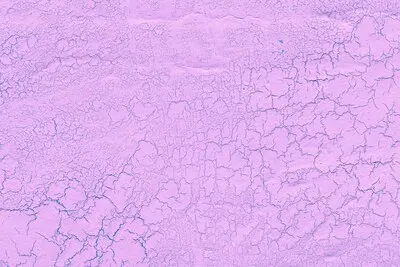 Pink lime plaster with cracks background