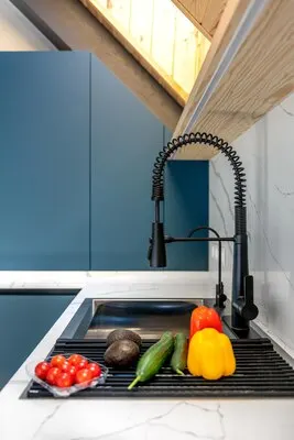 Bright plasticfree kitchen fresh vegetables minimalist interior