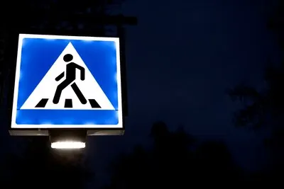 Pedestrian crosswalk sign in the city