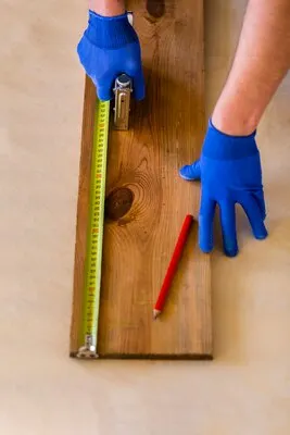 High angle of tape measure on wood