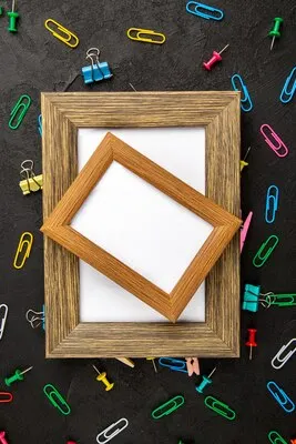 Top view elegant picture frames on dark surface gift present love photo portrait color family
