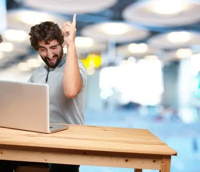 crazy young man with table .happy expression