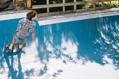 Man balancing on skateboard