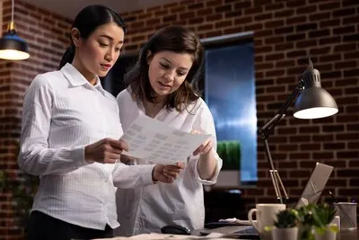 Diverse women working together in office