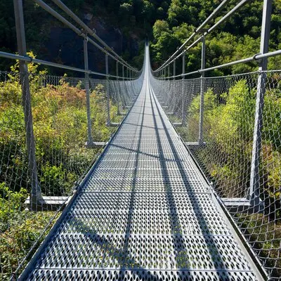 Vertical view on himalayan footbridge crossing the Drac near Lake Monteynard