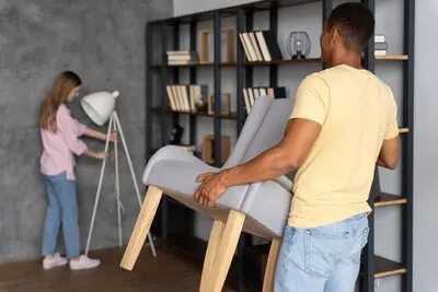 Close up on people making home comfortable